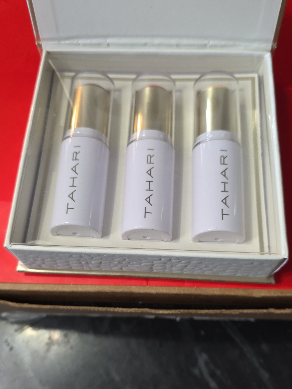 Tahari Lipstick Set in White and Gold Accents